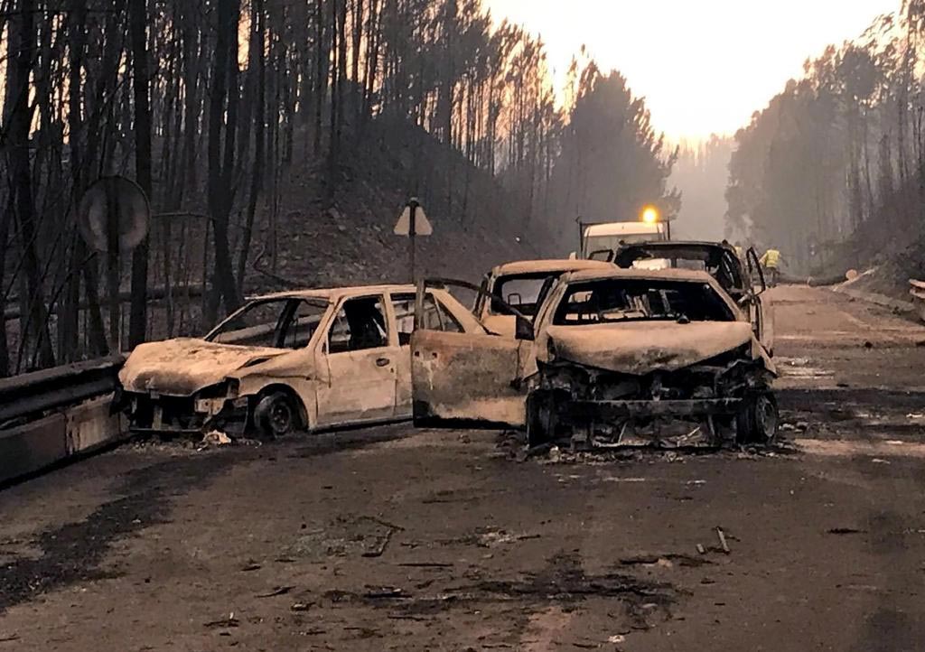 Cars burned on the road when the fatal victims tried to escape the fire in Pedrógão Grande